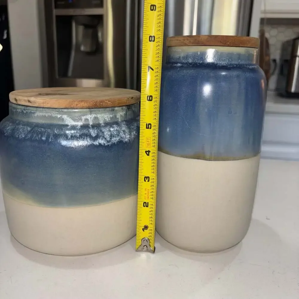 Set of 2 World Market Blue and Cream Ceramic Canisters Wooden Lids